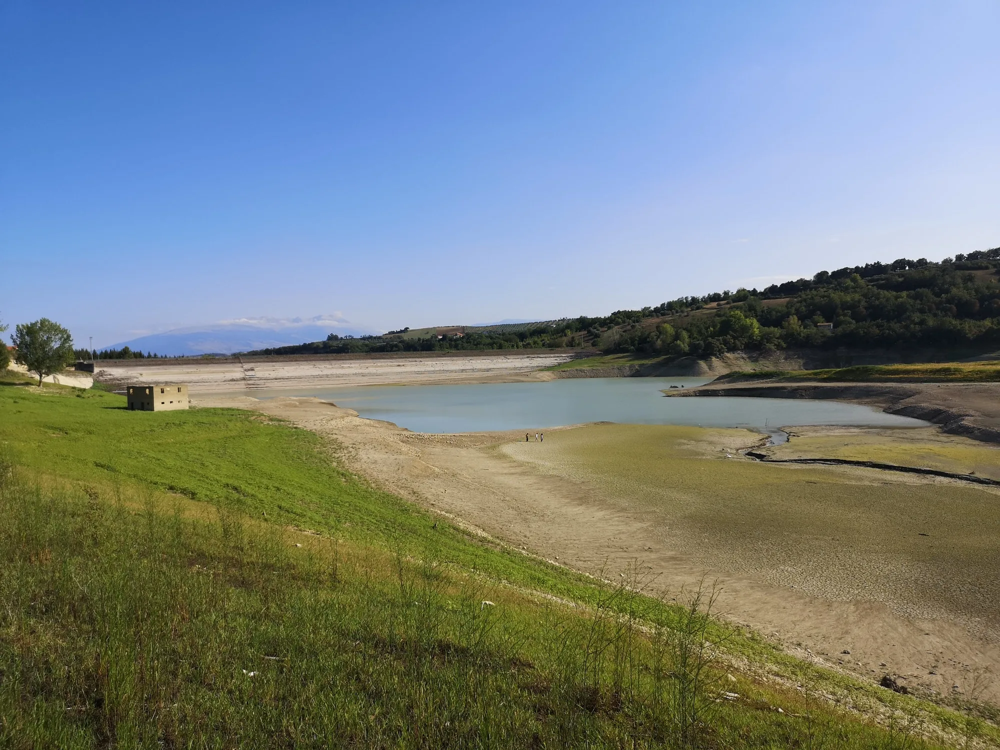Beautiful landscape view with a dried-up dam and thickly growing trees in Penne, Abruzzo in Italy