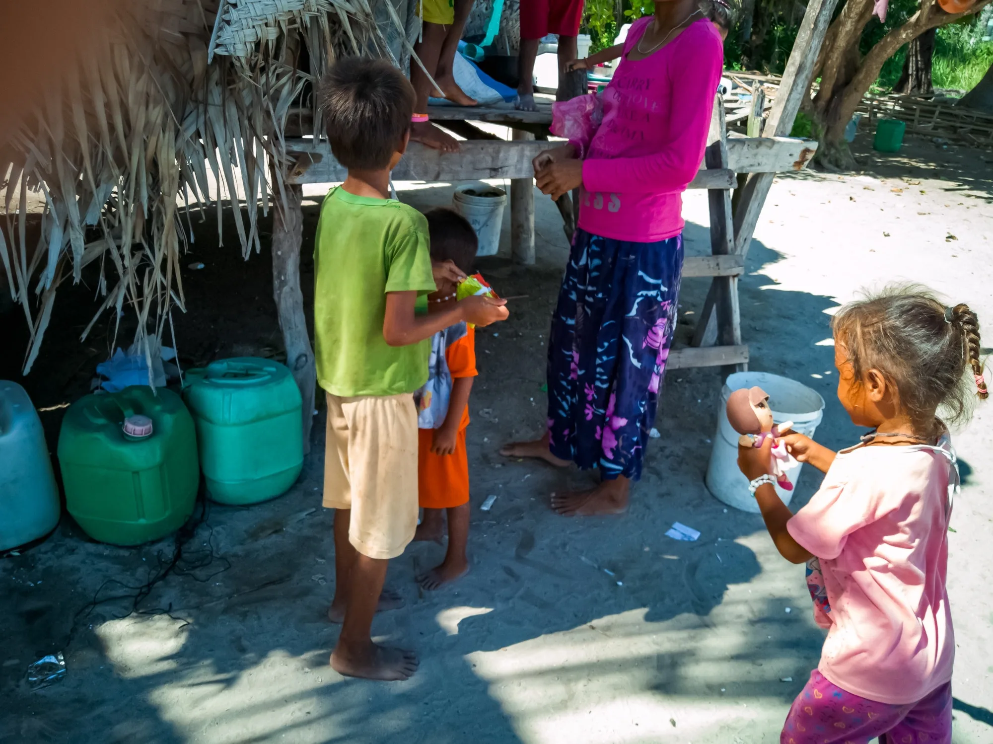 children of sea gypsies in their village in an island